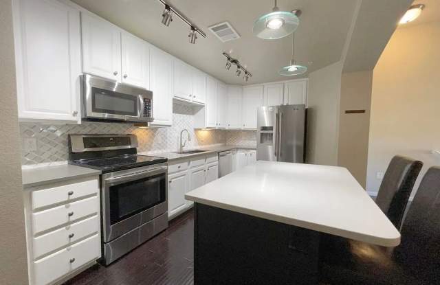 Modern 2 Bed/2 Bath Townhome with Pool Access & Attached Garage - Available June 1 photos photos Modern 2 Bed/2 Bath Townhome with Pool Access & Attached Garage - Available June 1 photos photos