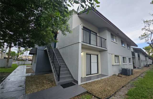 6901 NW 179th St - 6901 Northwest 179th Street, Country Club, FL 33015