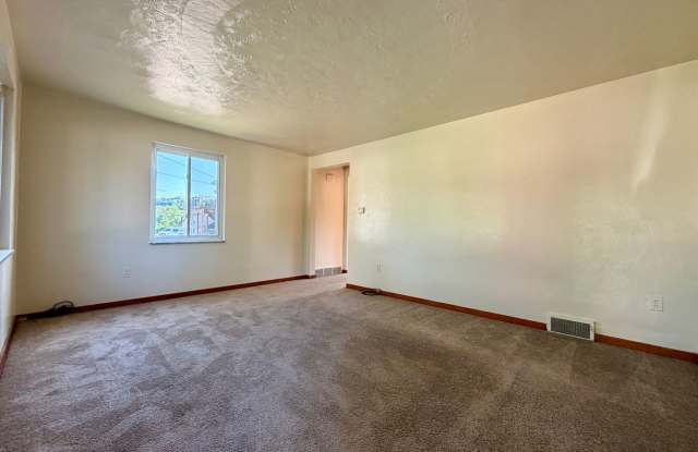 Charming Two Bedroom Townhome with a Private Basement & a Shared Backyard Space! Call Today! Gallery 4