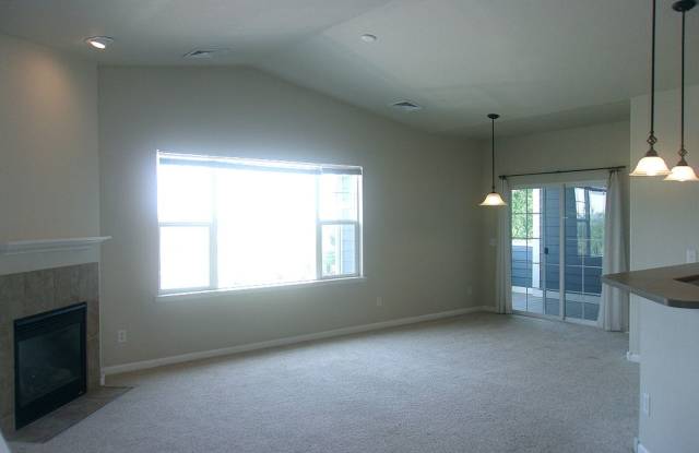 Light-Filled 2 Bed, 2 Bath Condo | Fireplace, Patio & Detached Garage Gallery 3