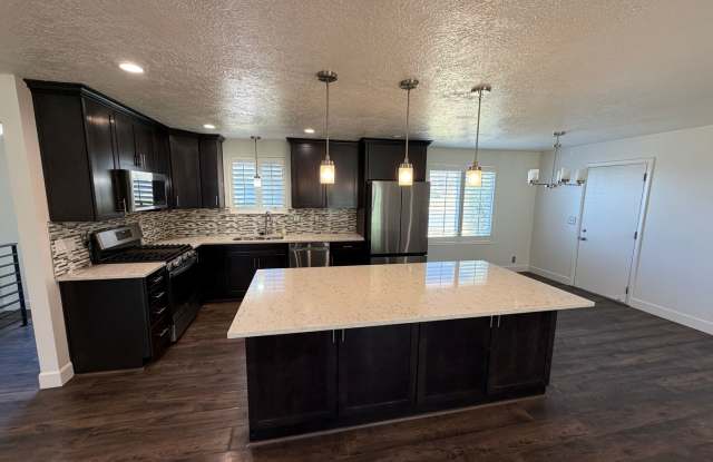 Spacious 4 Bed, 2 Bath Home with Fenced Yard photos photos