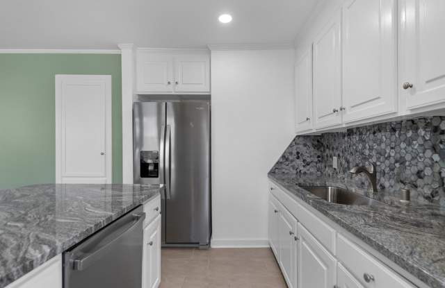 Freshly Renovated Cammack Village Home with Hardwood Floors & Spacious Backyard Gallery 4