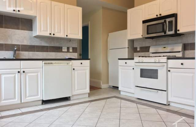 $3,600 Spacious 3BR in Brookline | 1,600 SF | In-Unit Laundry + Private Outdoor Space photos photos