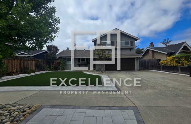 Beautiful 3/2.5 Home With 2 Fireplaces, Updated Kitchen, Spacious Yard and Covered Patio photos photos