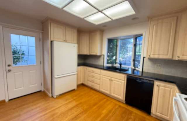 Charming 3-4 Bed/3 Bath Home in Belmont with a Garage, Patio and Beautiful Backyard! photos photos