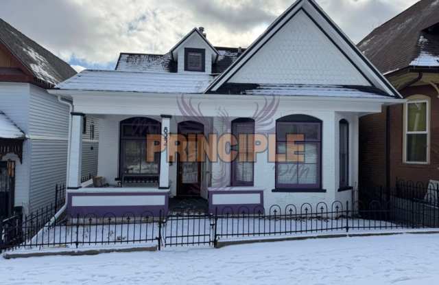 Charming Three-Bedroom Home with Garage and Yard photos photos