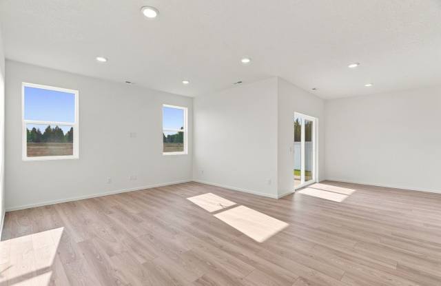 Modern 4-Bedroom Home with a 3-Car Garage & Covered Patio Gallery 4