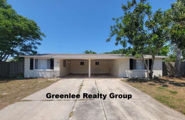 Cozy 2 Bed/1 Bath Duplex Apt with a Carport and Large Fenced Back Yard! photos photos