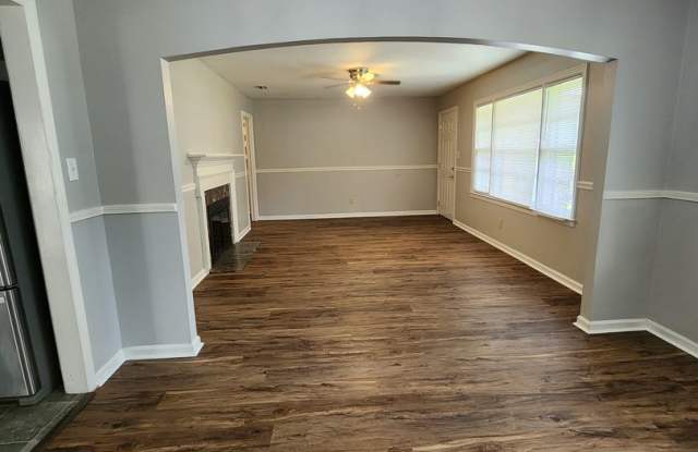 Spacious 4BR/2BA Brick Home with Fireplace, Large Island! NEW LVP Floors throughout! Gallery 3