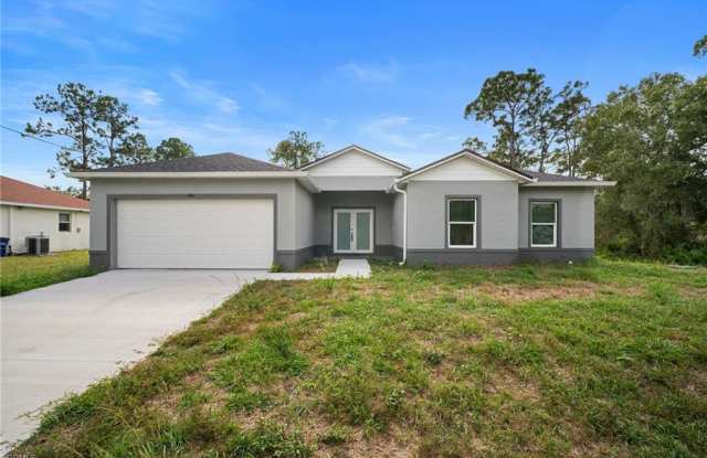 942 Sunrise Boulevard - 942 Sunrise Boulevard, Lehigh Acres, FL 33974