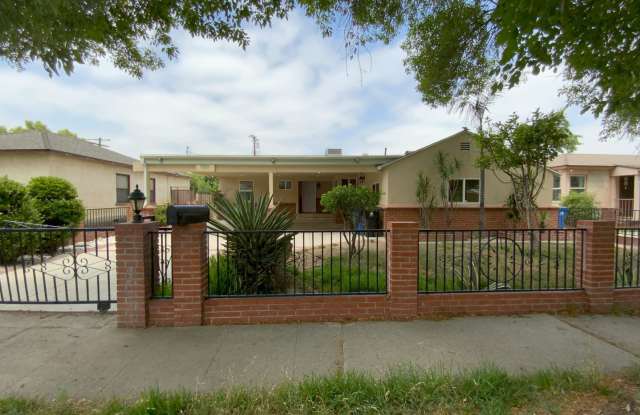 Charming 4-Bedroom Home on a Beautiful Tree-Lined Street – A Must-See Rental! photos photos