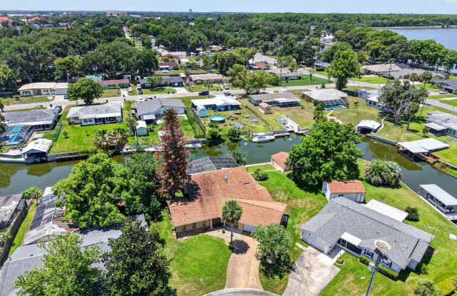 Available Now! Unique Canal-Front Pool Home with Boathouse & Chain of Lakes Access Gallery 4