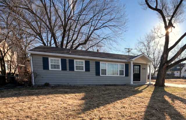 SEE IT NOW: Charming Home with Spacious Living, Modern Kitchen  Private Driveway in Overland Park! photos photos