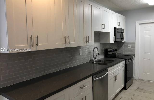 1235 NE 3rd Ave photos photos