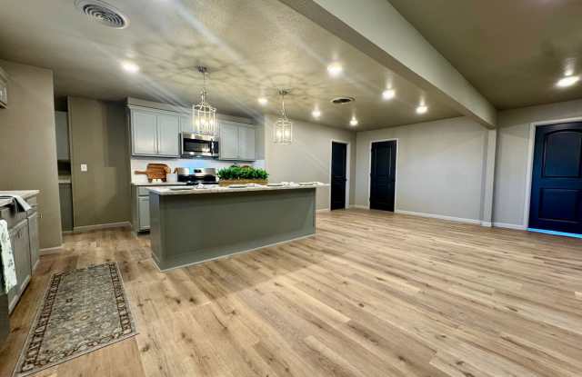 Spacious 5-Bedroom Home with Open Floor Plan, Kitchen Island & Great Storage Gallery 3