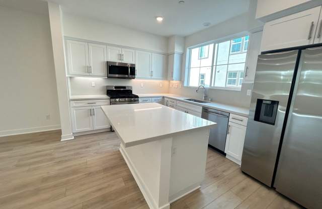 Gorgeous, 3 level townhome, featuring 2 car garage central Air, and in Unit laundry. photos photos