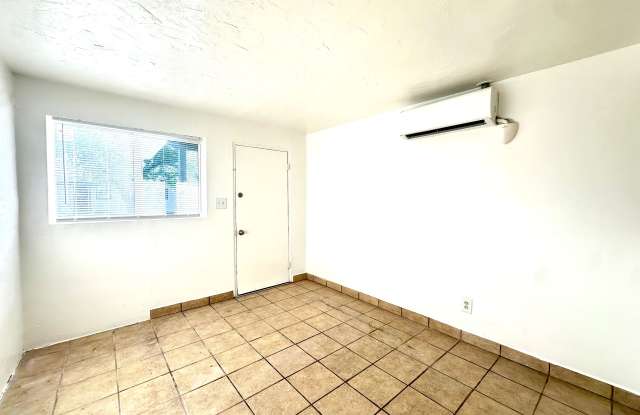 Studios and 1 bedrooms that include all utilities! Off Street Parking and Tile Flooring! photos photos
