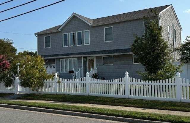 229 Riviera Drive E - 229 East Riviera Drive, Copiague, NY 11757