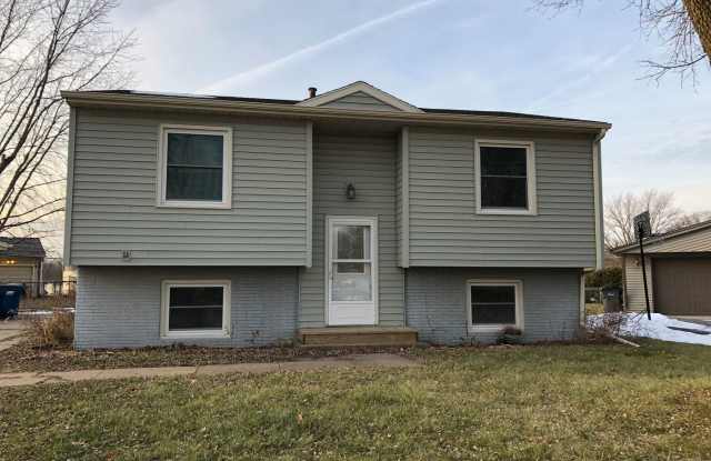Spacious 3-Bedroom Home with Finished Basement, Large fenced-in backyard, and 2-Car Detached Garage in Milan! photos photos