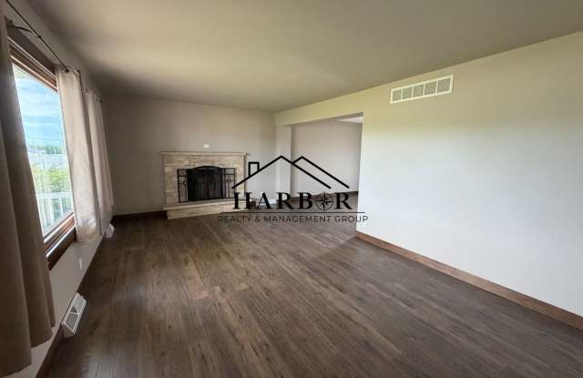 *First Months Rent Free* Spacious 3BR Home with 2-Stall Garage & Private Deck in Kasson Gallery 4