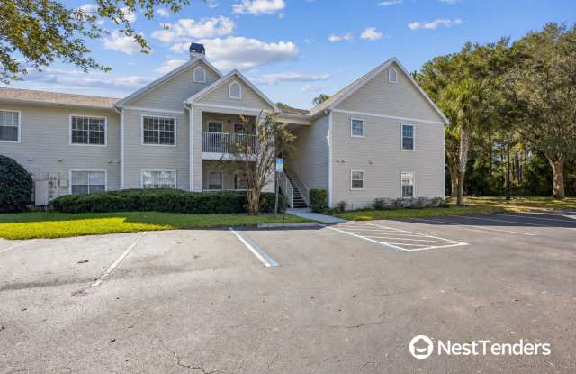 Beautiful Park Like Setting and Lake Views Await! Gallery 1