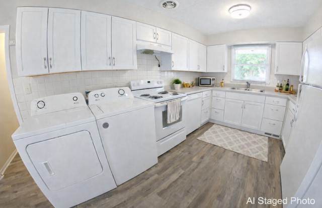 Across the Street from KSU Campus! Huge House + Two Kitchens + Two Sets of Washers  Dryers + Off-Street Parking! Available August 1st! photos photos