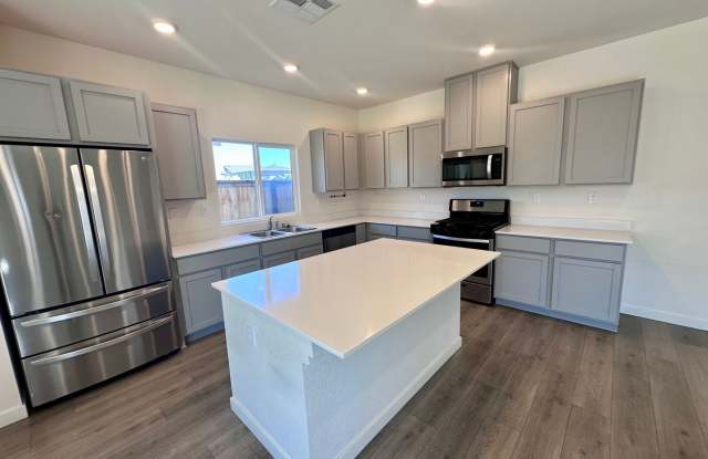 4 Bedroom + Den, 3 Baths newly built home in Kiley Ranch. Available Now. Includes Sewer and Trash. Gallery 4