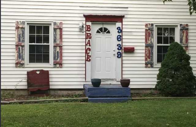 Cozy 3-Bedroom Home with Full Basement  Classic Charm photos photos