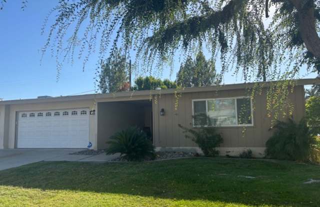 2 Bedroom Condo with Attached 2-Car Garage, Fireplace, Covered Patio & 55+ Community Amenities Gallery 1
