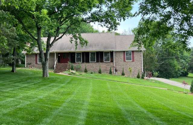 Single Family Home on almost an acre, 4 beds, 3 baths, Front Porch, Great Storage Space, and Great Yard photos photos