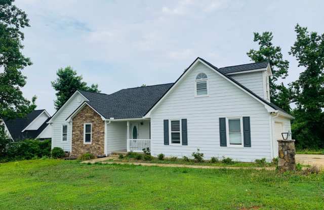 Great location, private/wooded lot, large deck, 4th bedroom up w/attic storage, 2 car garage, fully renovated, must see! photos photos