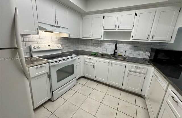 6955 W 2nd Ct - 6955 West 2nd Court, Hialeah, FL 33014
