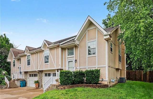 Newly Updated 3 Bed/2 Bath Duplex in Blue Valley with Fenced Yard, Large Deck & Attached 2-Car Garage in Overland Park photos photos