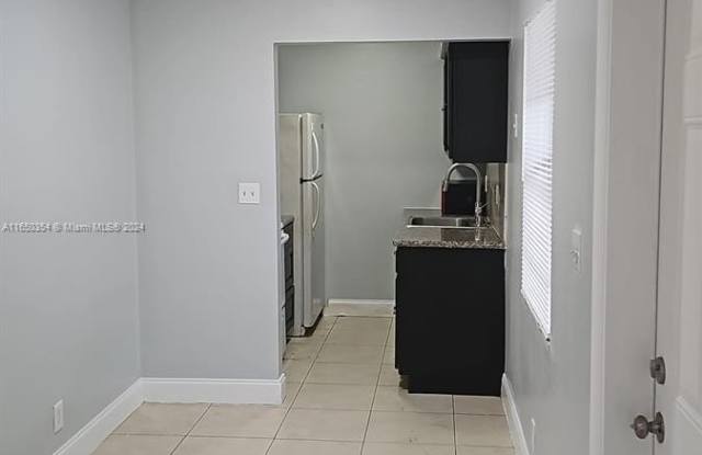 4040 NW 30th Ter - 4040 Northwest 30th Terrace, Lauderdale Lakes, FL 33309