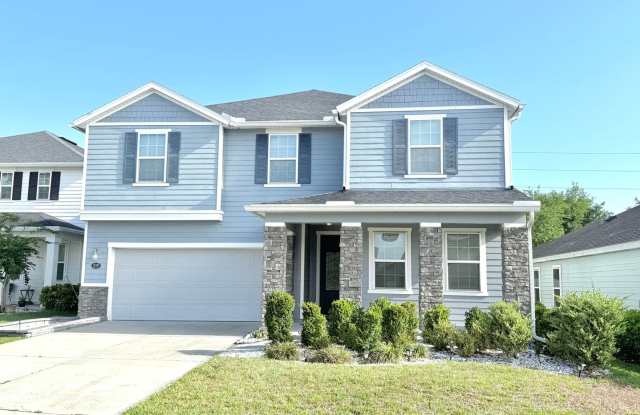 5BR Home with Downstairs Guest Suite, Screened Lanai & Fenced Yard photos photos