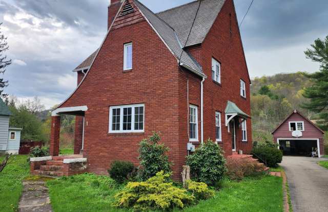 Four Bedroom Single Family home in Derreck City; Large Yard, Garage, and Rear Deck! photos photos
