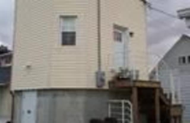 437 Guy Lombardo Ave - 437 Guy Lombardo Avenue, Freeport, NY 11520