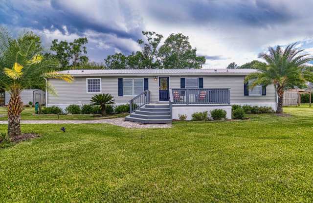 Home on half acre with land and storage photos photos