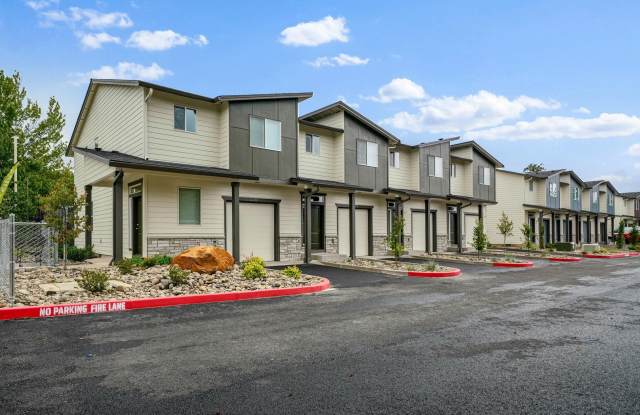 Brand New - Modern 3-Bedroom Townhomes with A/C, Attached Garage & Private Patio! Gallery 1