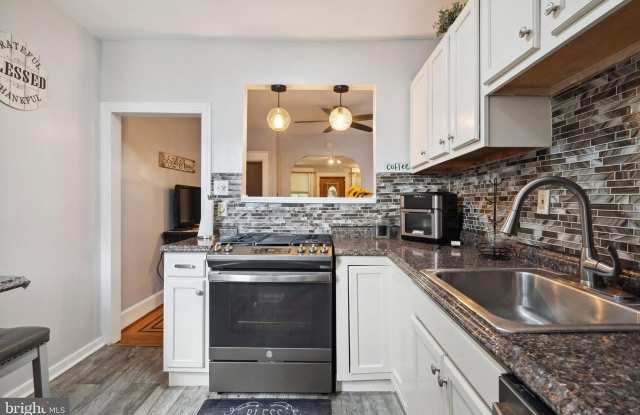 7117 Woolston Avenue Gallery 2