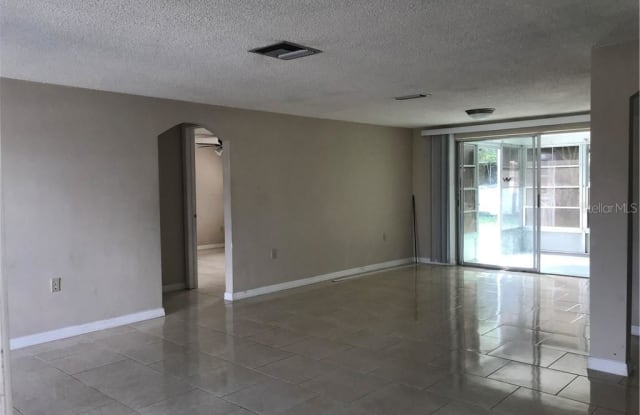 10231 REGENCY PARK BOULEVARD - 10231 Regency Park Boulevard, Jasmine Estates, FL 34668