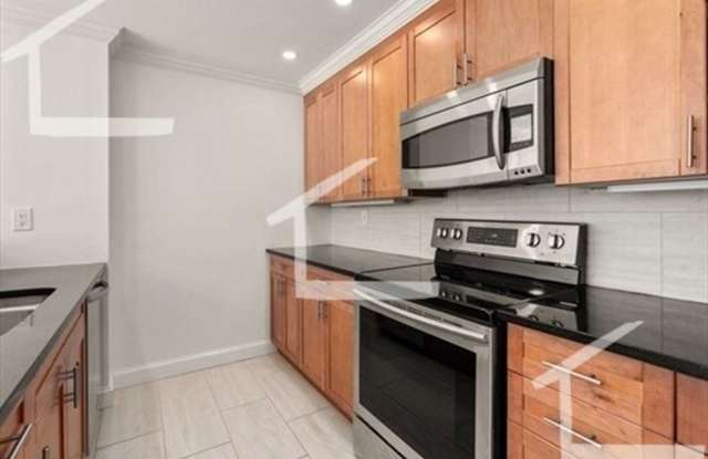 Luxury 2 bed condo in a high end building with full gym, swimming pool and 2 garage parking spots! photos photos