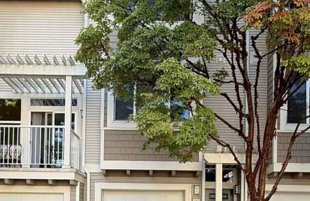Inviting 2-Bed, 2-Bath Townhome with Updated Kitchen, Gas Fireplace & Washer + Dryer Gallery 3