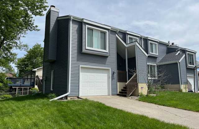 2 BR, 1.5 BA Clive split level duplex.  Deck and one car attached garage. photos photos