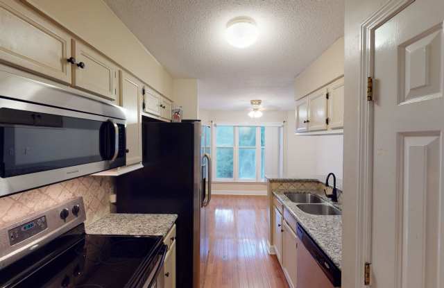 Wonderful Uptown renovated top floor condo! Gallery 4