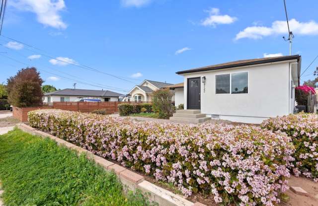 Spacious 4 Bed / 3 Bath Home with Private Driveway, In-Unit Laundry Gallery 1