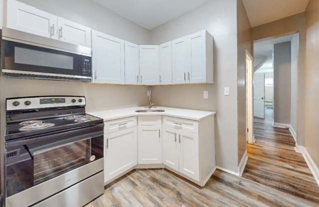 Spacious 3-Bedroom, 1-Bathroom home with Modern Amenities in East Baltimore! photos photos