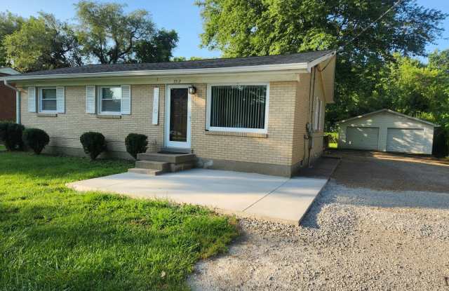 Beautiful and spacious 3 bedroom 1 bath home with large detached garage and updates! photos photos