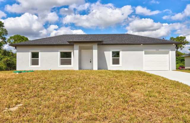BRAND NEW 3B/2B/1 CAR GARGE- SW LEHIGH ACRES - 2726 6th Street Southwest, Lehigh Acres, FL 33976
