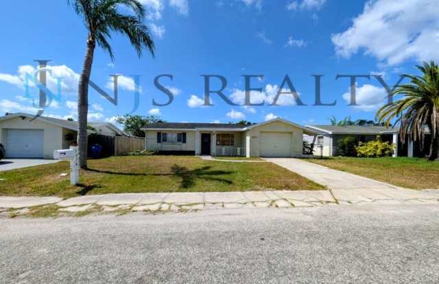 Gorgeous 3/2/1 1200 Sq. Ft. with fenced yard, all tile floors, custom baths and remodeled kitchen!! photos photos